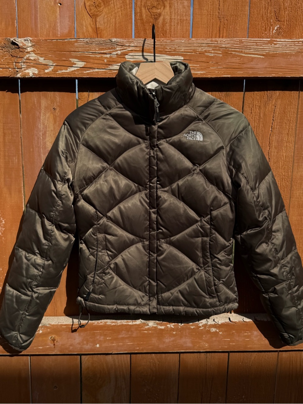 The North Face women’s Olive Green Packable Puffer Jacket